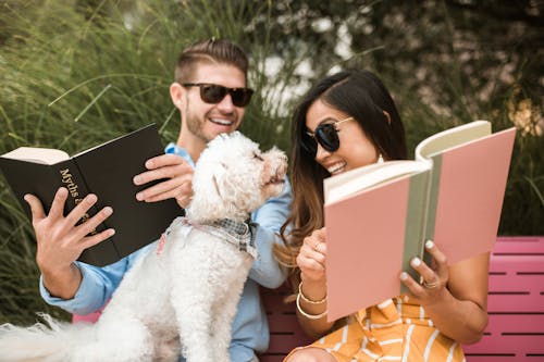 A Couple With Their Pet Dog 