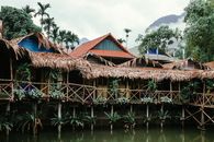 Brown Wooden House on Water
