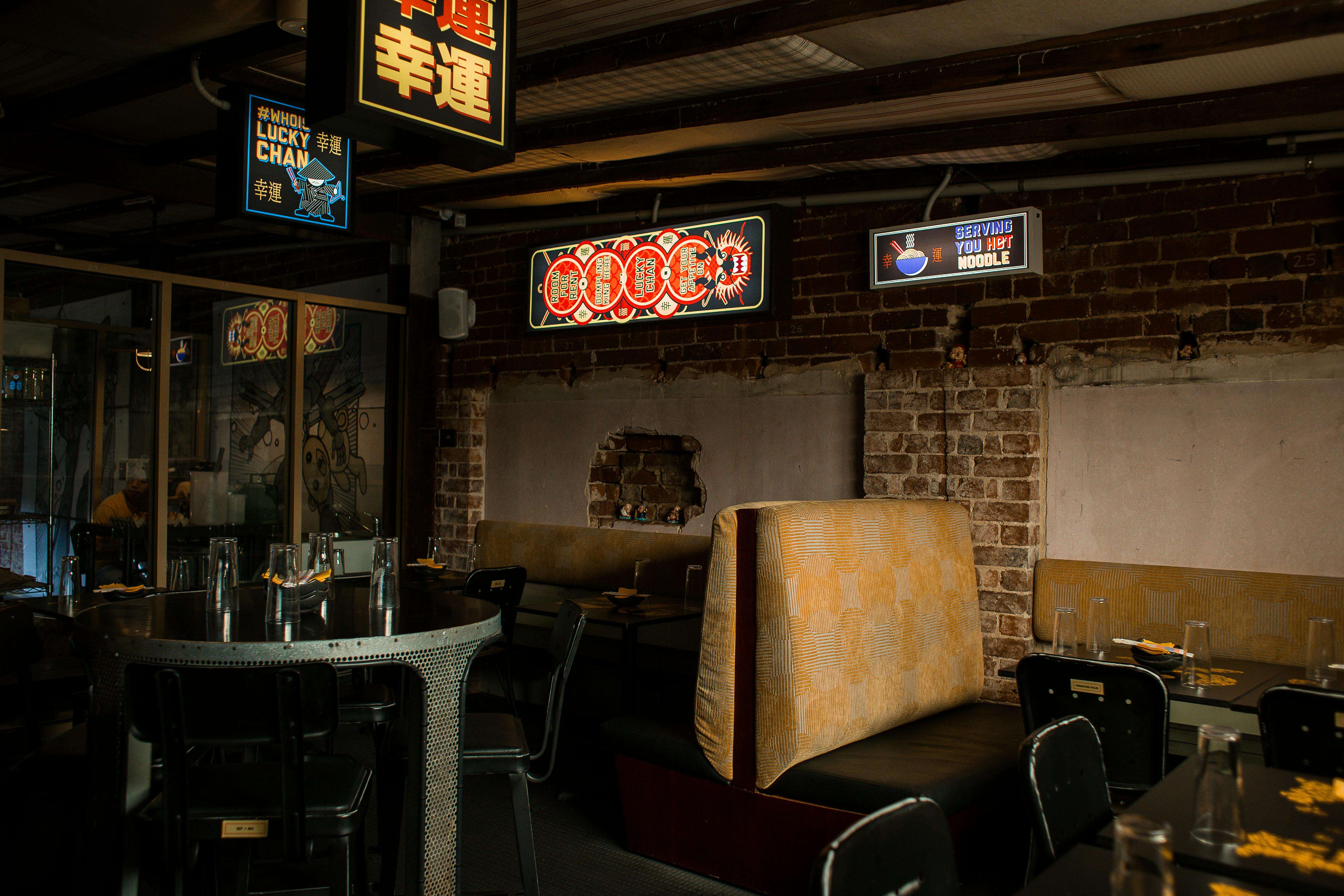 Warm and inviting Asian-themed restaurant interior with vibrant decor.