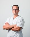 Man in White Button Up Shirt Wearing Eyeglasses