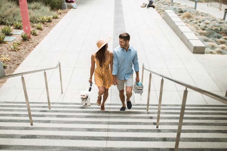 Romantic Couple Walking Up Stairs