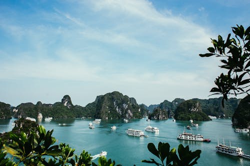 Cruise Ships Sailing Across Tropical Sea