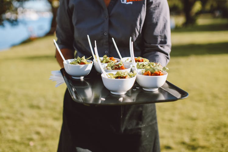 Food On Bowls Over A Serving Tray