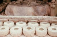 White Tissue Rolls on Brown Wooden Table