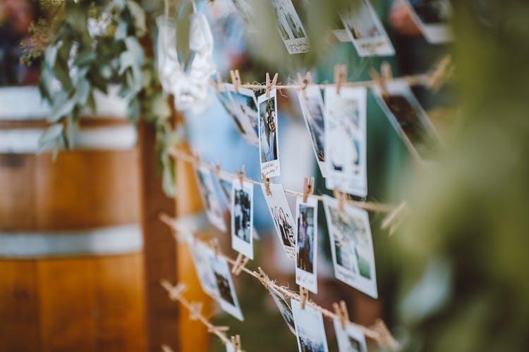 Close-up Of Polaroids Hung On A String 