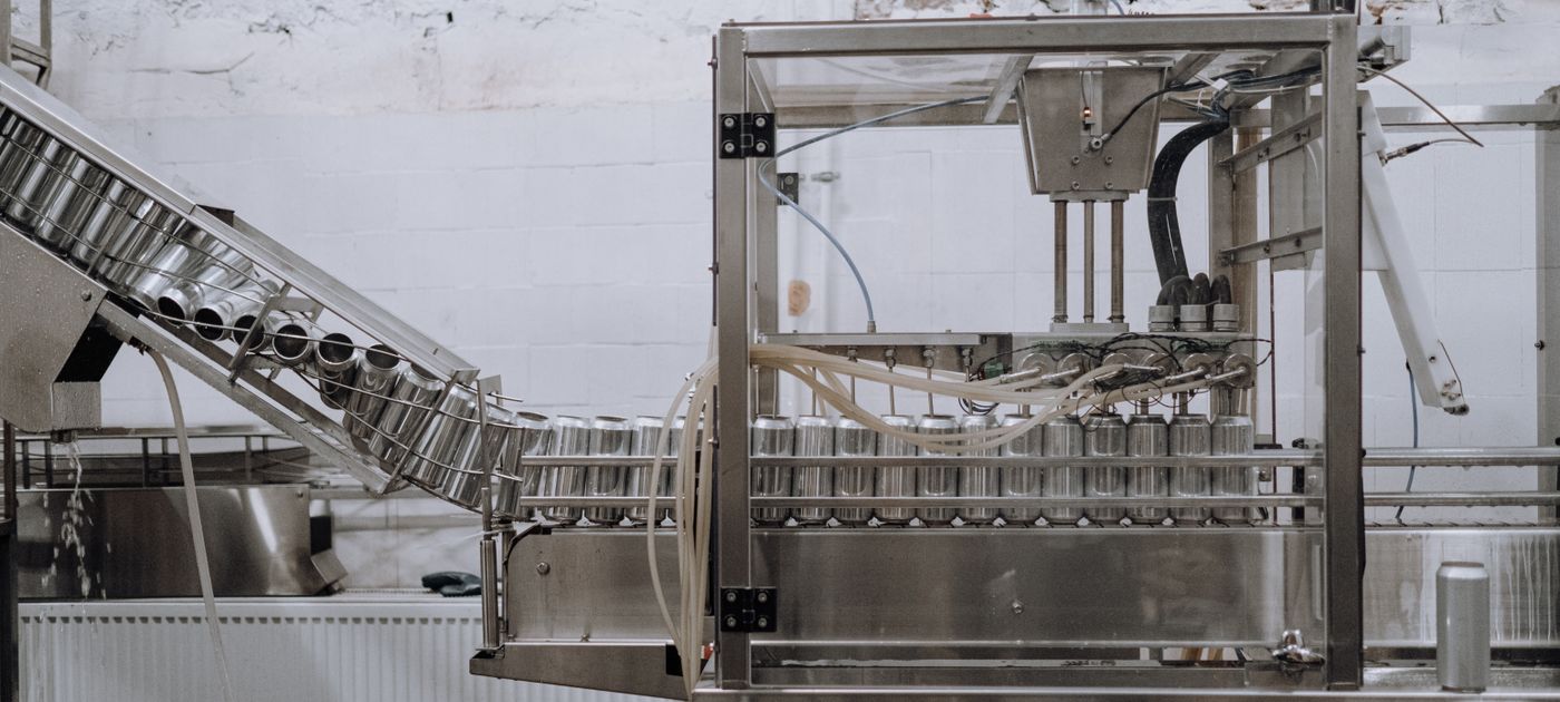 An automated food packaging line — halal certification requires a documented pest control programme in the facility