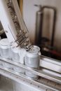 White Plastic Containers on White Shelf