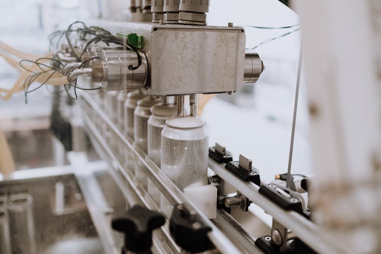 Machine Filling Beer In Aluminum Cans