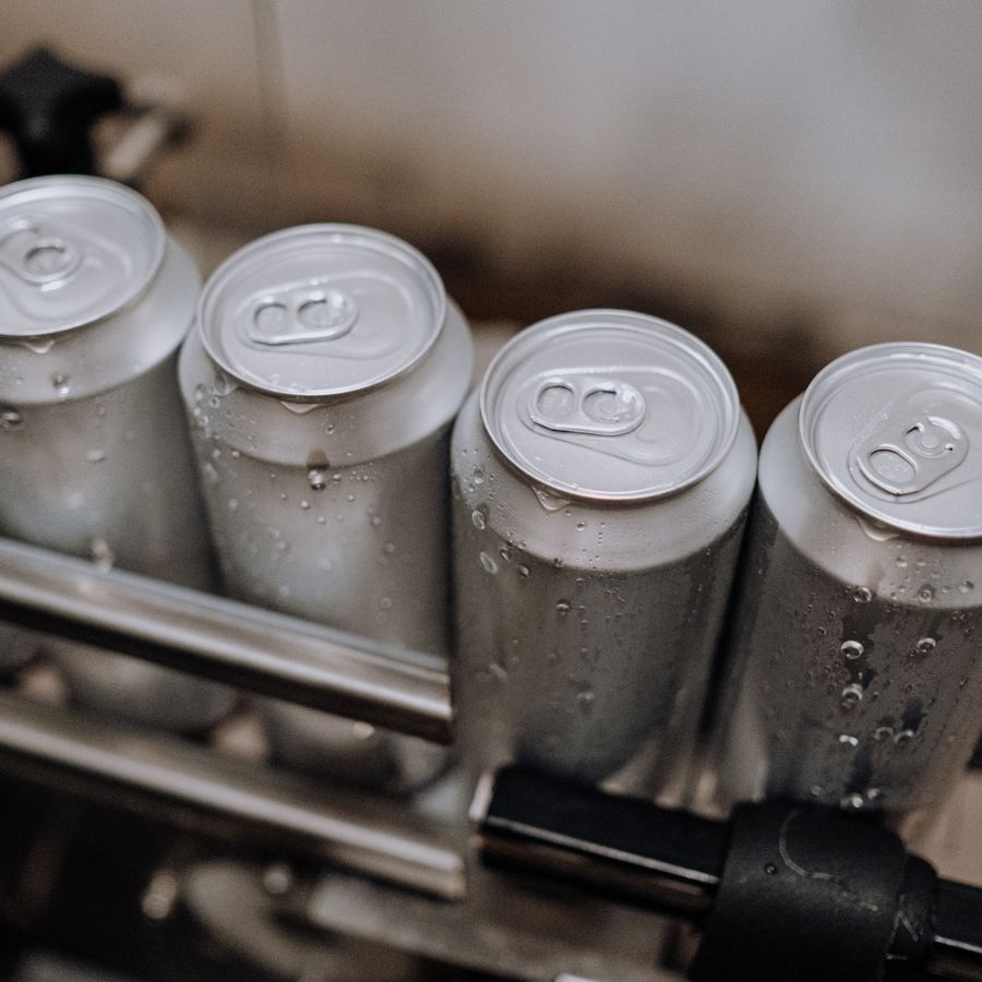 Cans moving along a production line