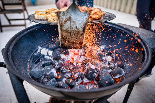 Free Grilling Meat on a Charcoal Grill Stock Photo