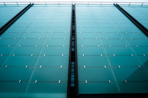 Low Angle Shot of a Glass Building