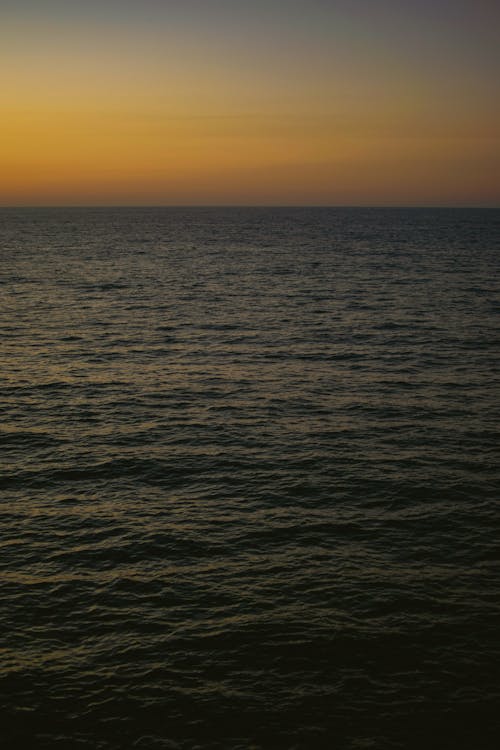 Scenic View of a Calm Sea during Sunset