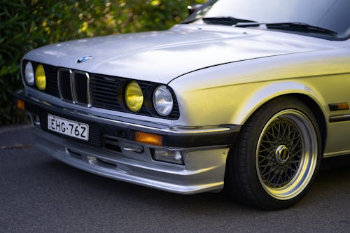 A Silver BMW Car Parked on the Road