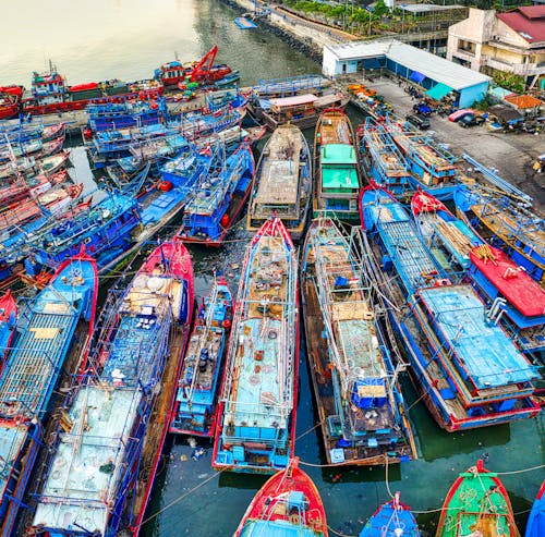 An Aerial Shot of Boats Docked on a Harbor