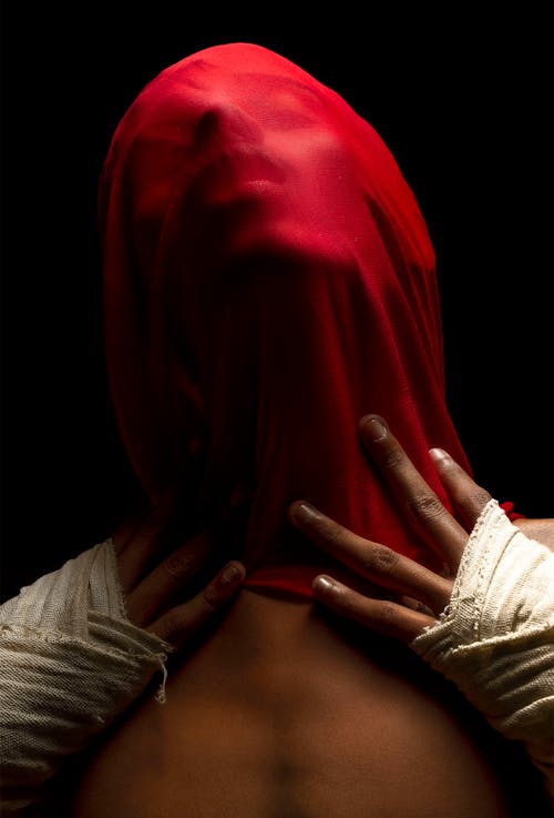 A Person Covered with Red Cloth