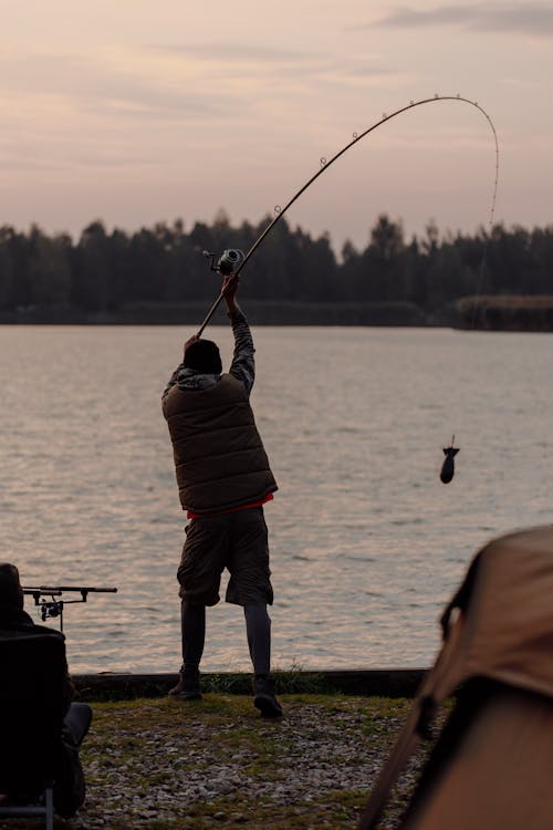 Boy Holding Fishing Rod · Free Stock Photo