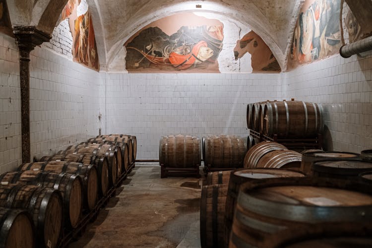 Wooden Barrels In A Storage