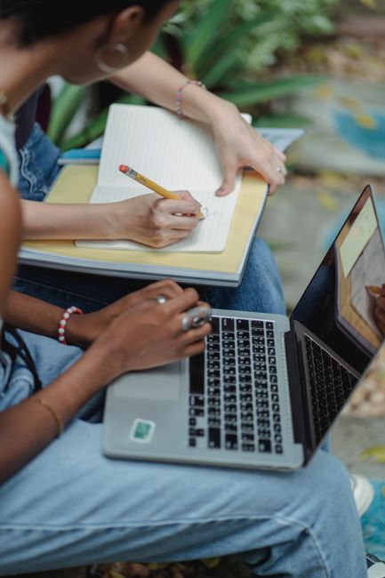 Student using AI writing tool on laptop