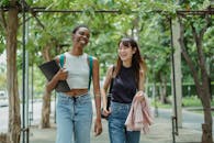 Laughing multiethnic women in alley