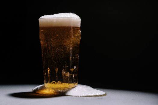 A Clear Drinking Glass With Beer