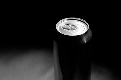 Grayscale Photo of a Can