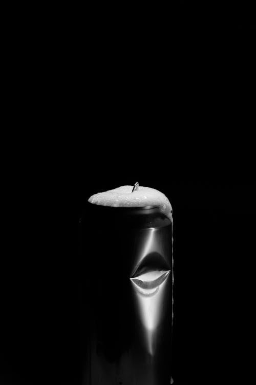 Grayscale Photo of a Can