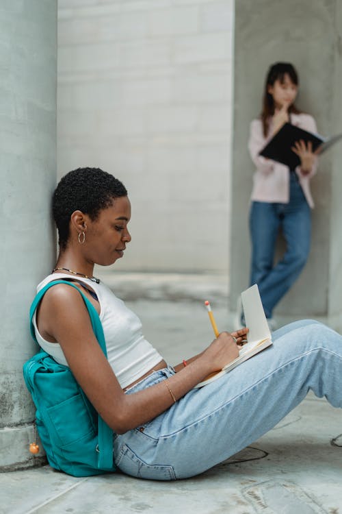 Diverse students doing homework together