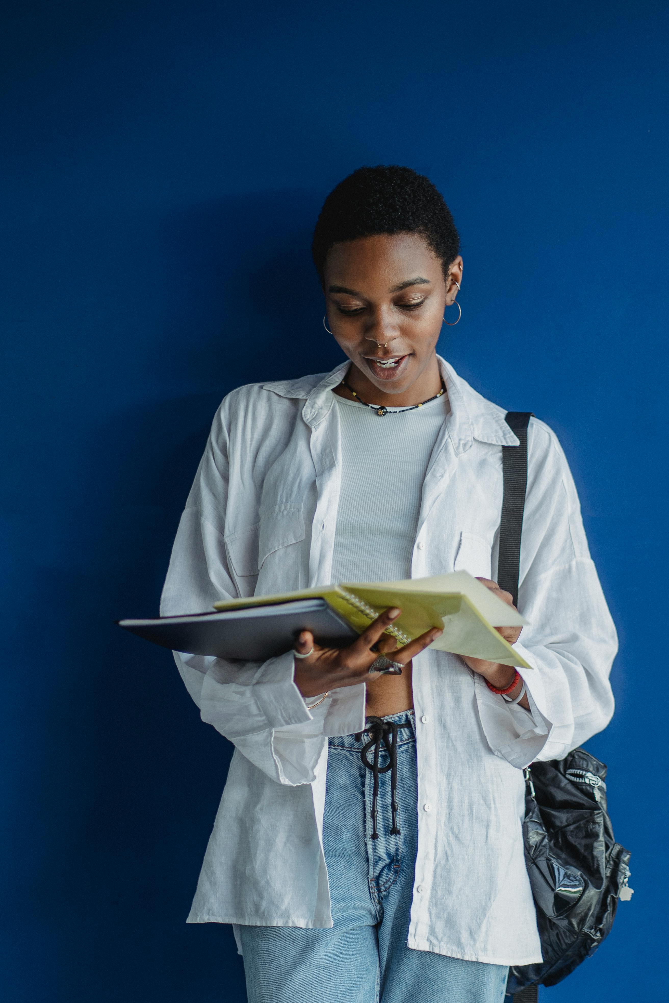 african american female student studying with notepad