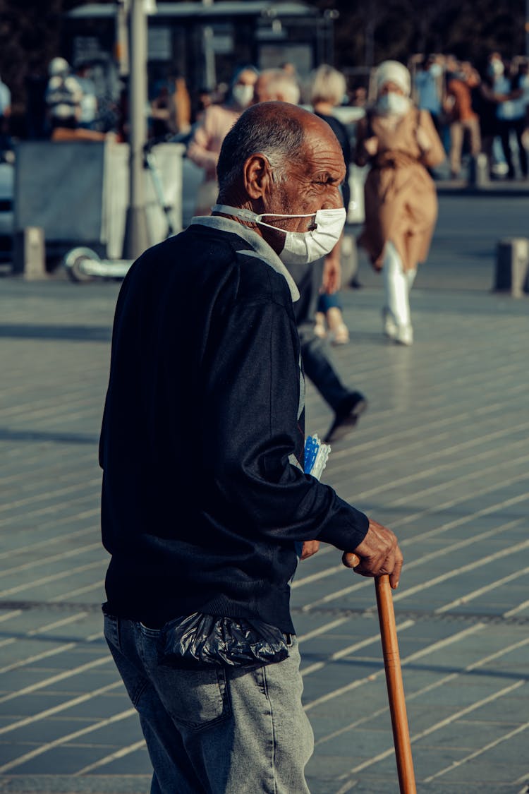 Shallow Focus Of An Elderly Man Wearing A Face Mask