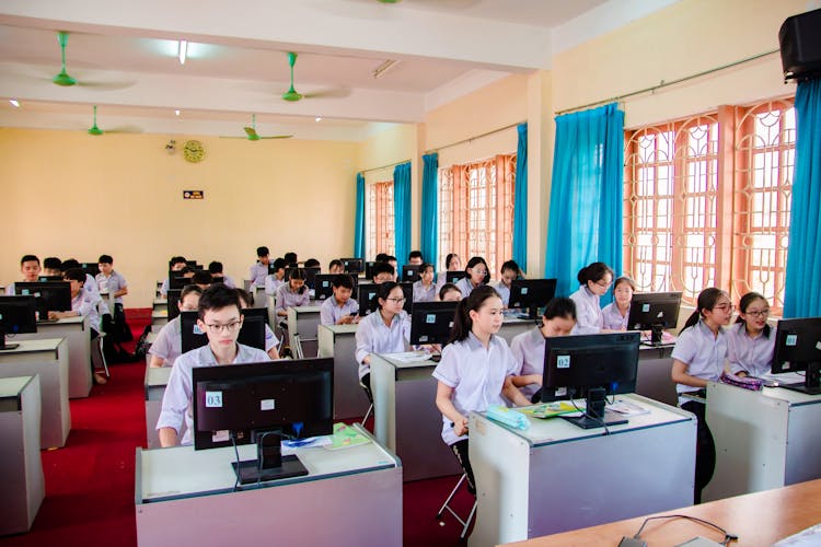 Children Using Computers In A Classroom