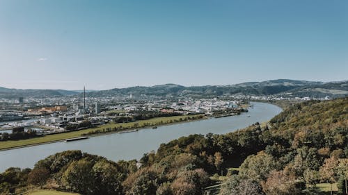 Gratis lagerfoto af å, arkitektur, blå himmel