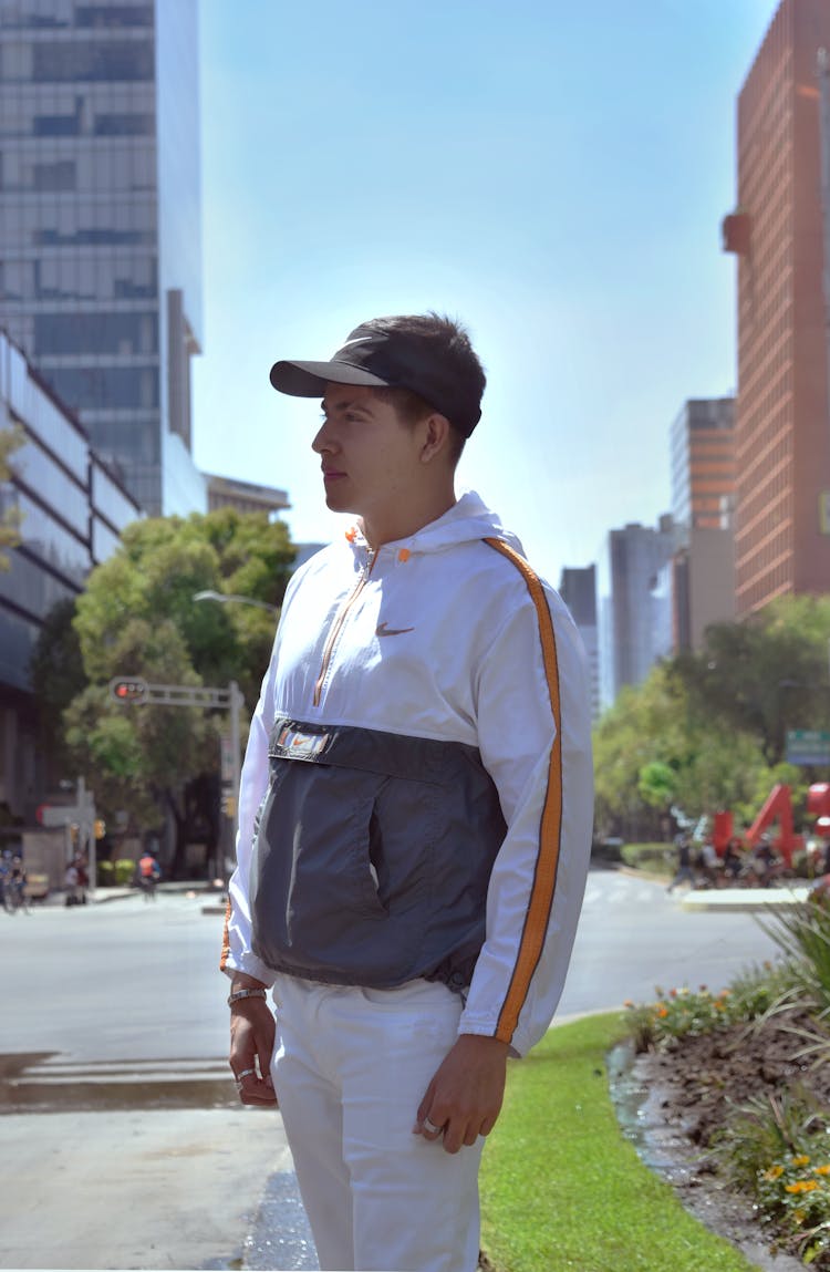 Man Wearing Sports Hat And Jacket