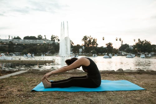 Woman Doing Yoga at a Park