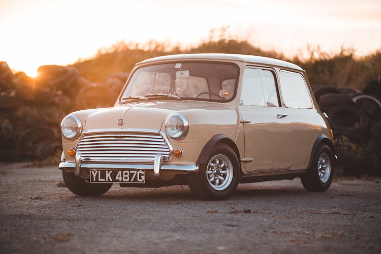 Vintage Car Parked On Road In Countryside