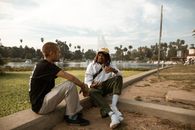 Man and Woman Sitting on Bench