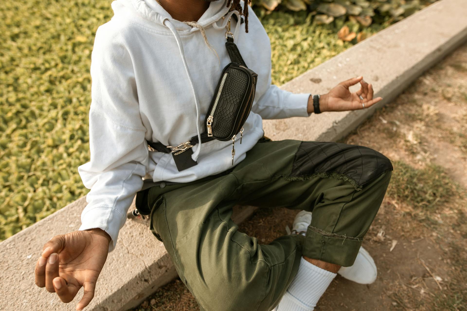 Person Sitting and Meditating Outside