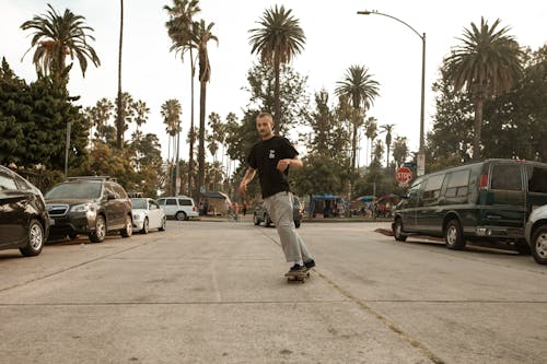 Man in Black Shirt Skateboarding