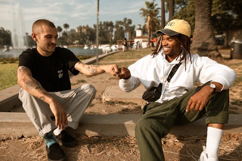 Men in the Park Doing a Fist Bump 