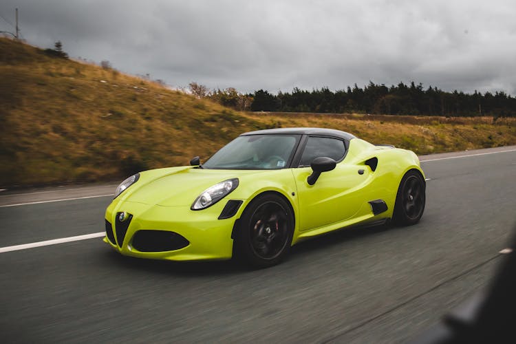 Fast Racing Car Driving On Countryside Road