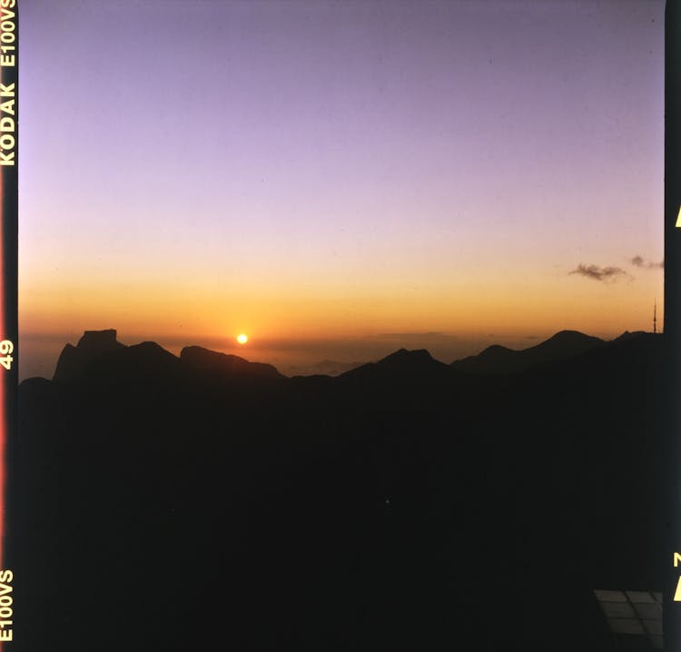 Film Shot Of Sunset In Mountains