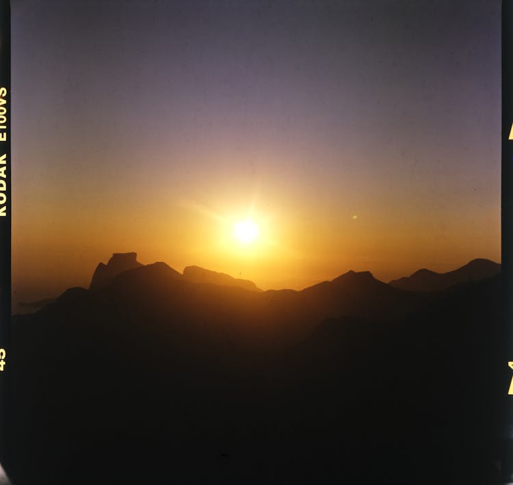 Shot Of Sunrise In Dark Mountains