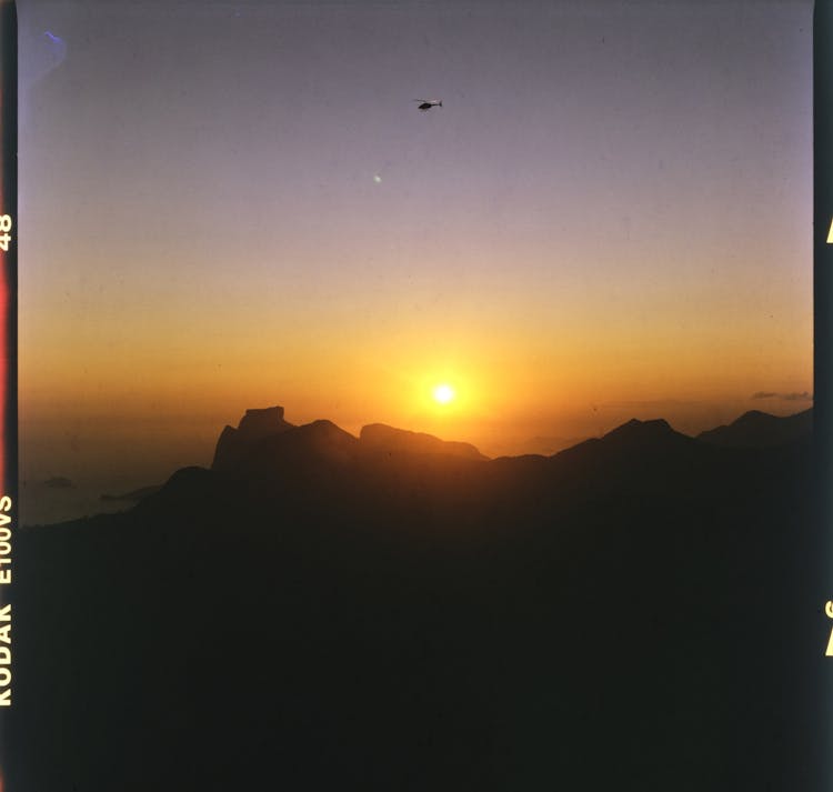 Peaceful Sunrise Above Mountain Range