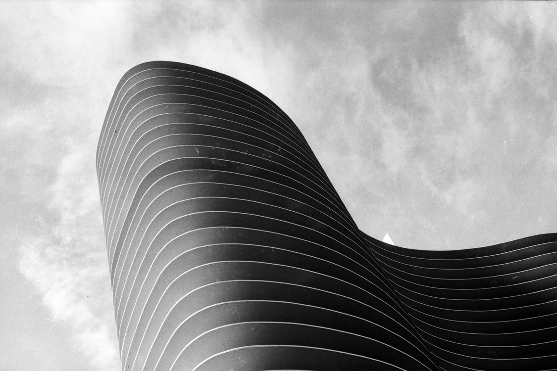 Rounded corner of modern building · Free Stock Photo
