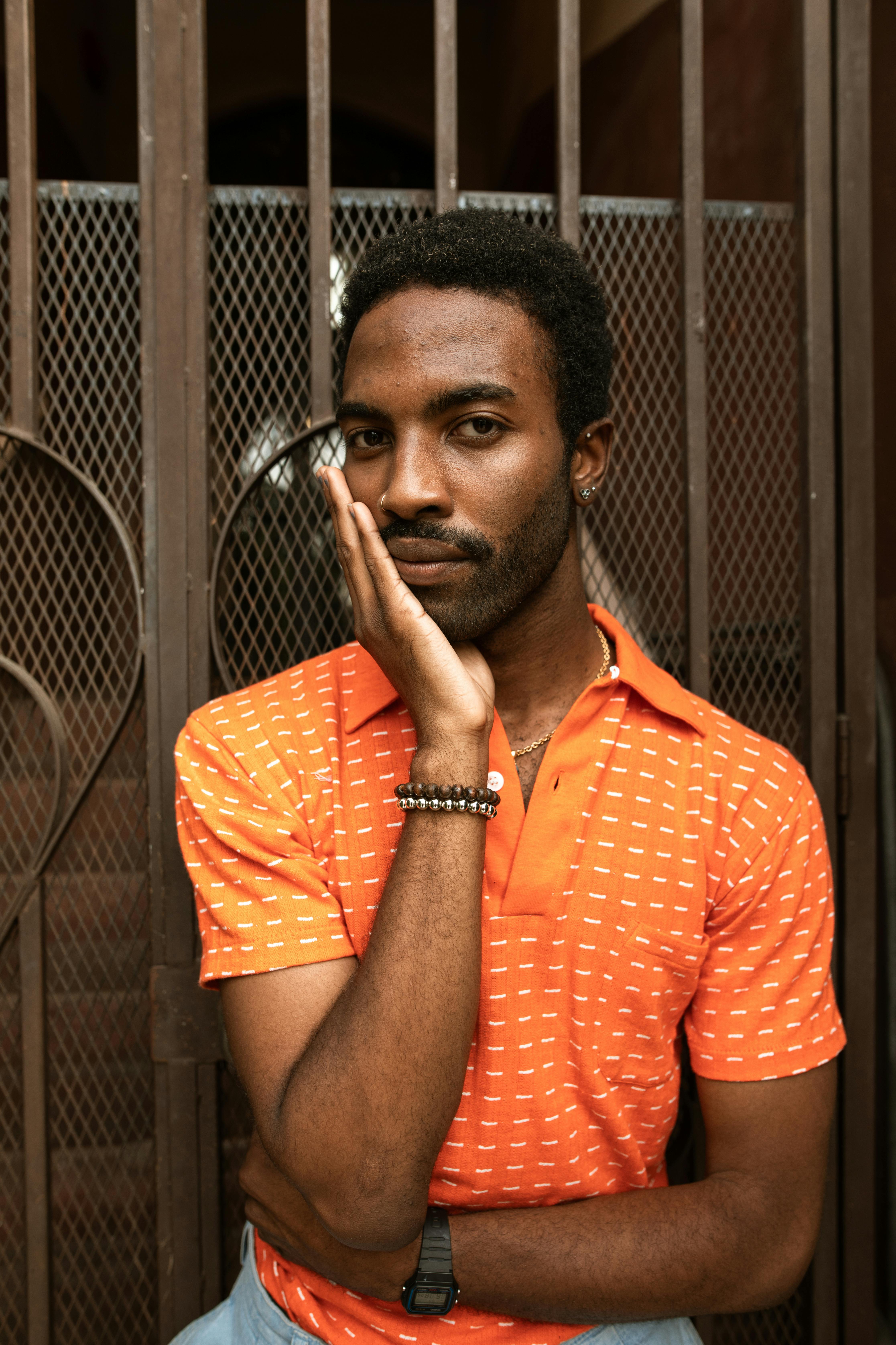 A Man Posing with his hand on his Cheek · Free Stock Photo