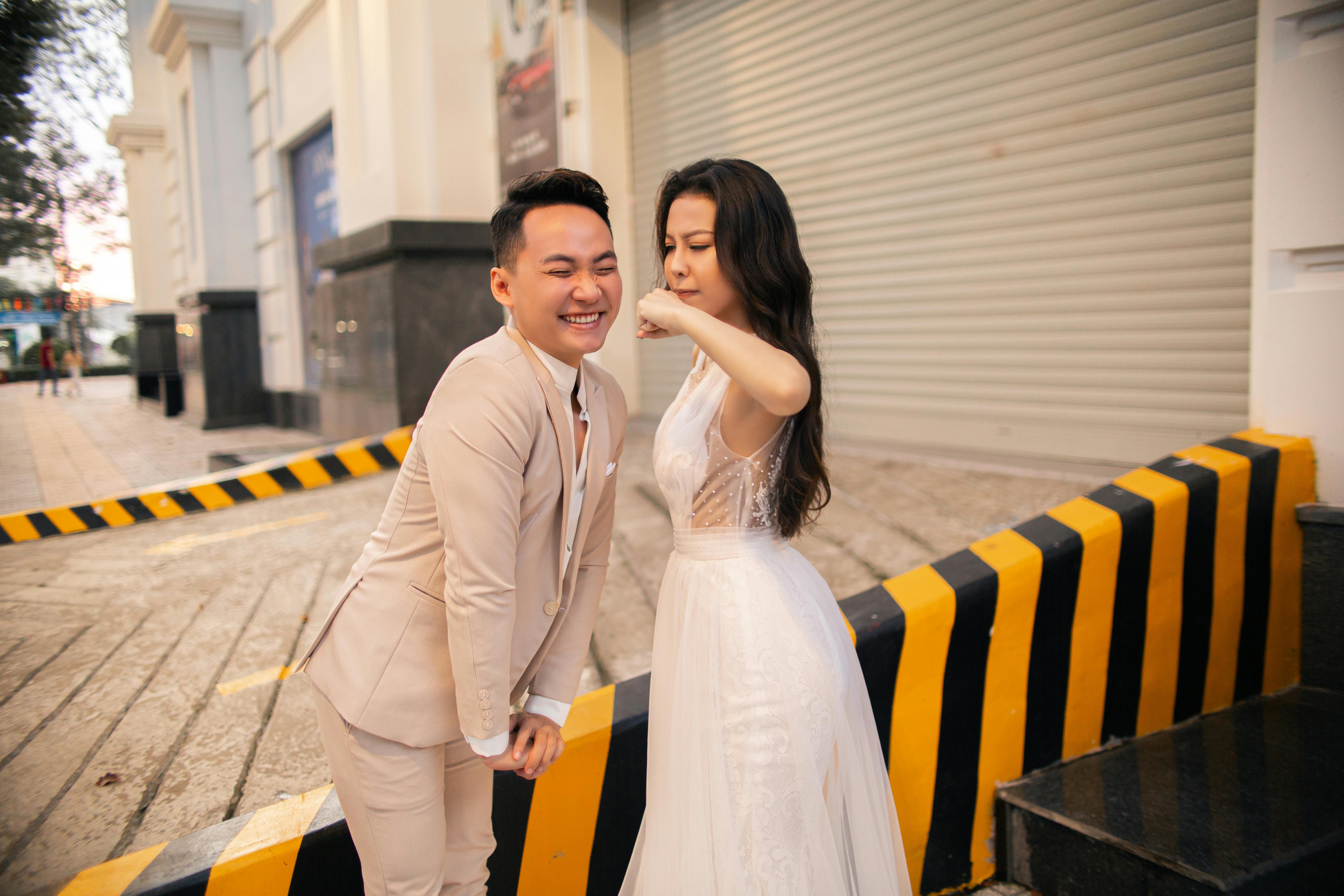 A Bride about to Punch a Groom · Free Stock Photo