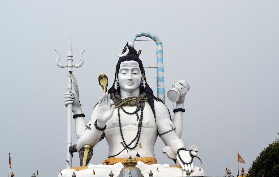 Statue of Shiva Under White Sky