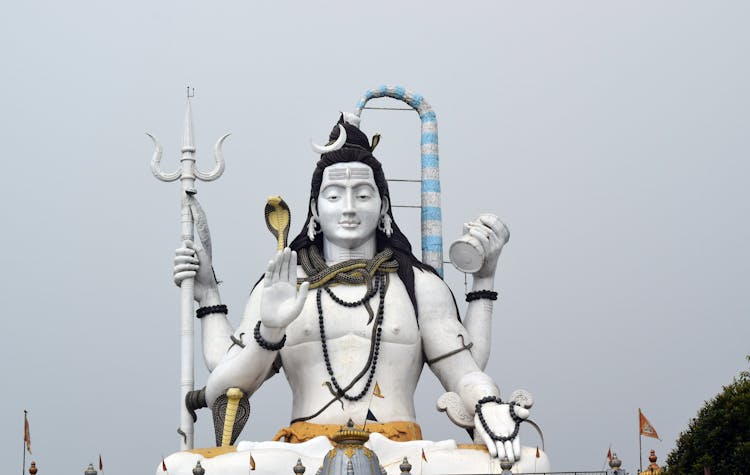 Statue Of Shiva Under White Sky