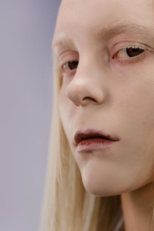Pale Expression A Woman with Pale Face Seriously Looking at the Camera · Free Stock Photo