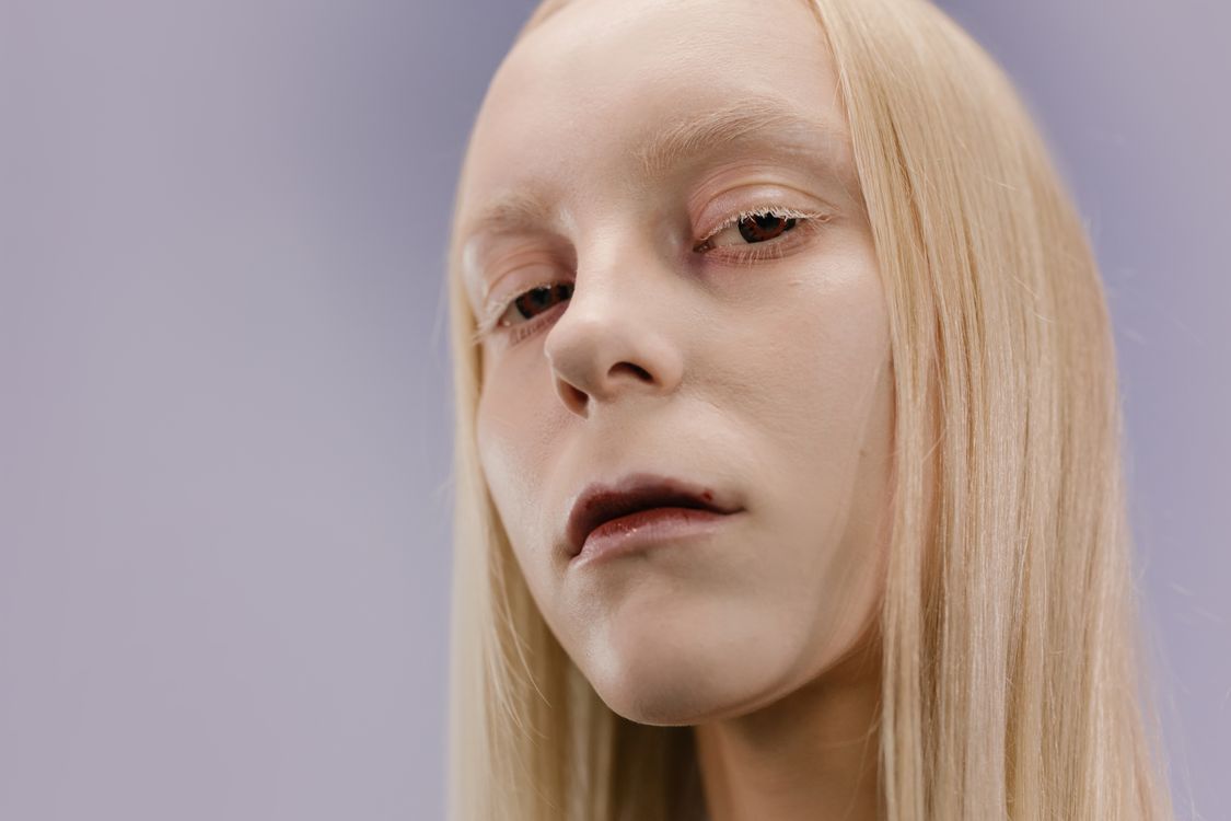 Pale Expression A Pale Woman Seriously Looking at the Camera · Free Stock Photo