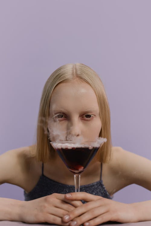 A Woman Holding Cocktail Glass